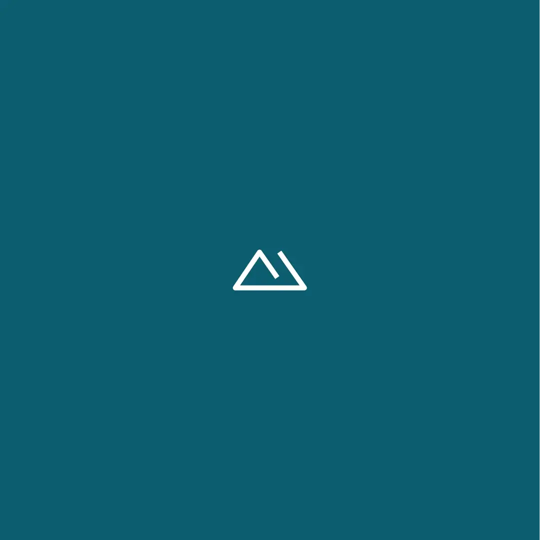 メンデスミット symbol white over blue background